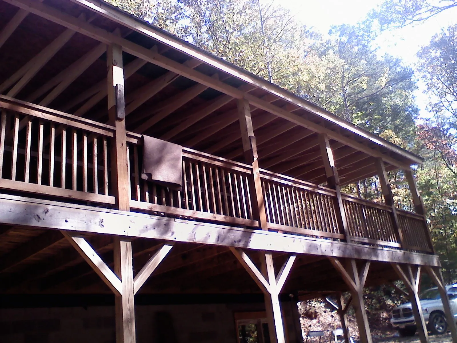Timber framing under a new elevated porch and deck — Roof Leak Repair in Birmingham by Roofing Brothers